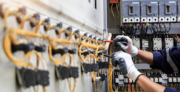 Professional Electrician technician working in Sunset Beach, NC